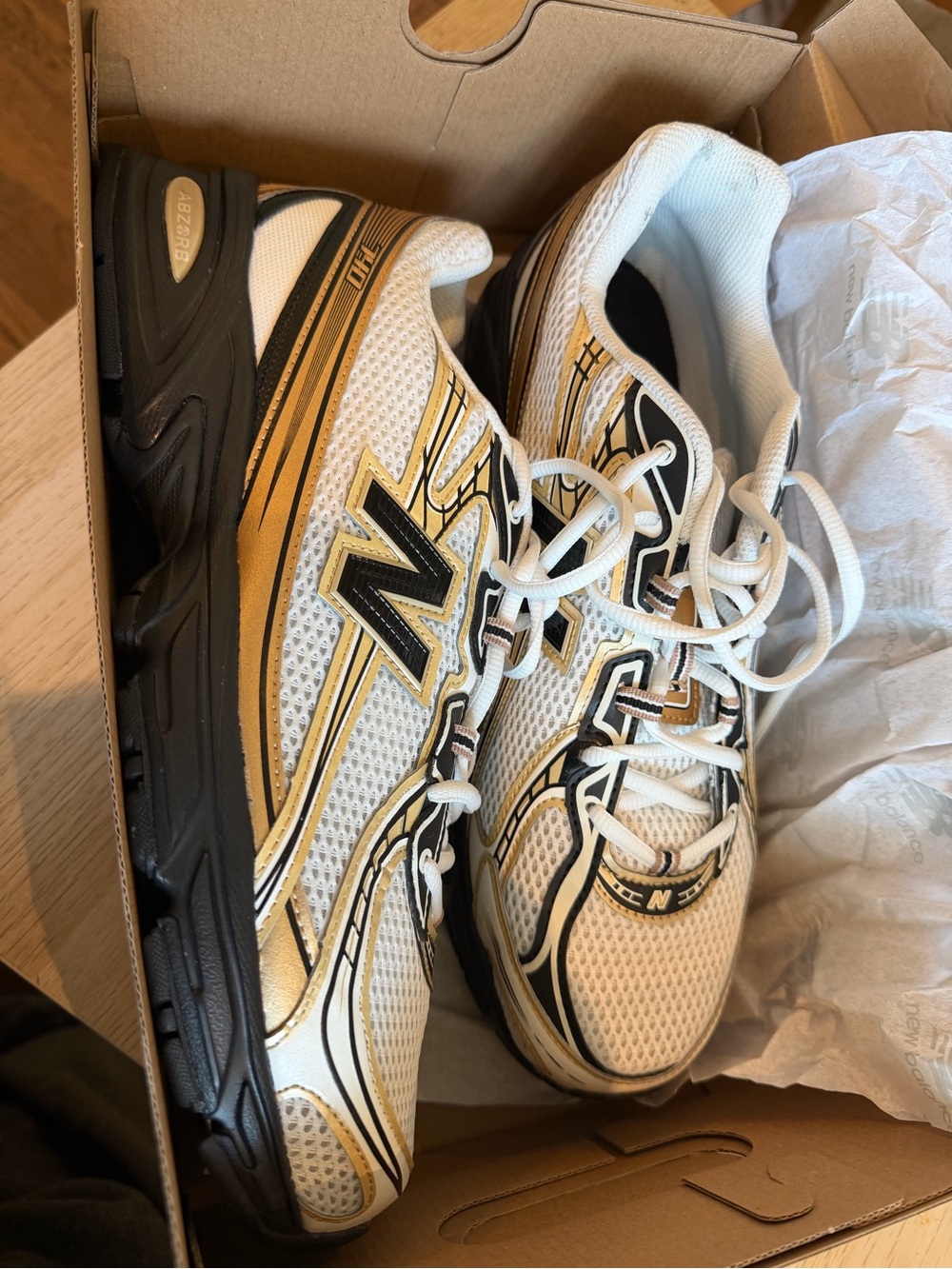 New Balance White, Gold & Black Athletic Sneakers